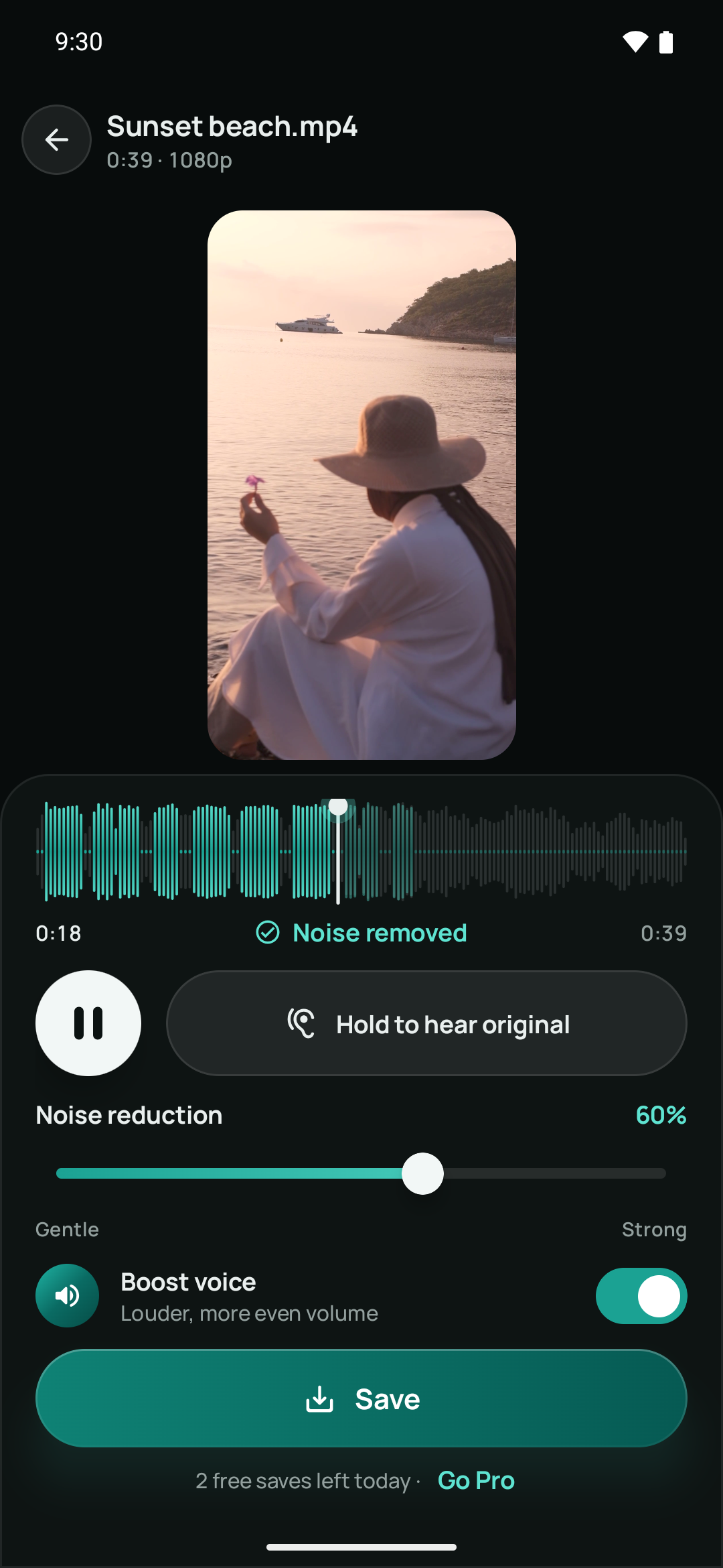 Noise Remover playing a beach video with a cleaned waveform, hold-to-compare button, noise reduction slider and Boost voice toggle